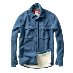 Blue denim shirt with white lining on a white background