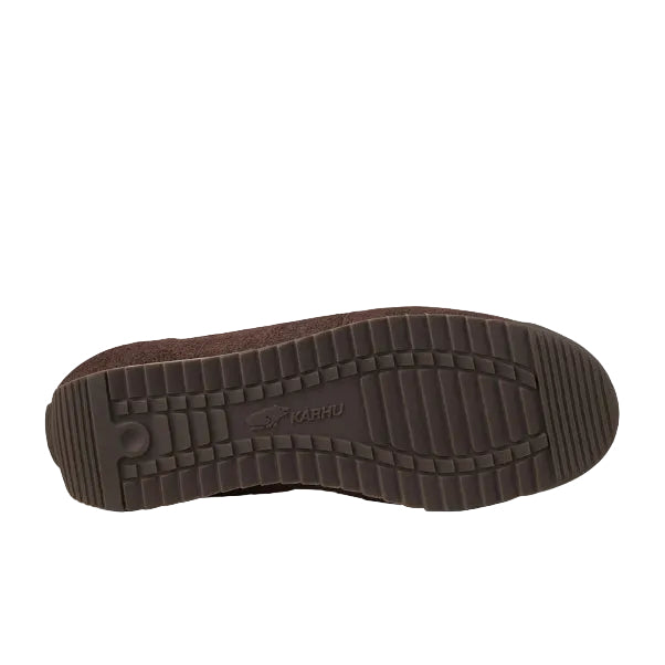 The brown rubber outsole of a shoe, showing the tread pattern and embossed 'PARNY' brand logo, photographed from a top-down view on a white background.