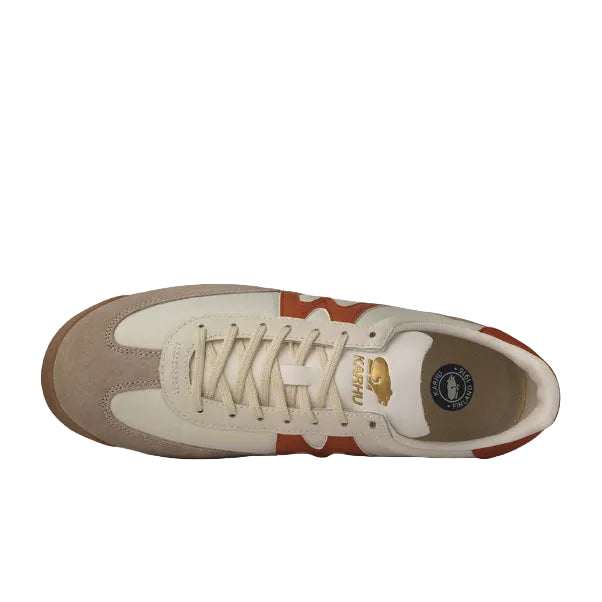Sneaker with a visible brand logo on a white background
