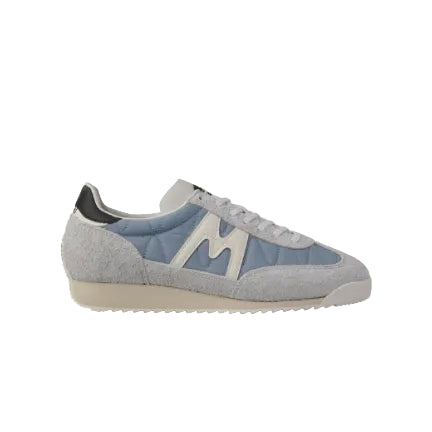 Gray and blue sneaker with a brand logo on a white background