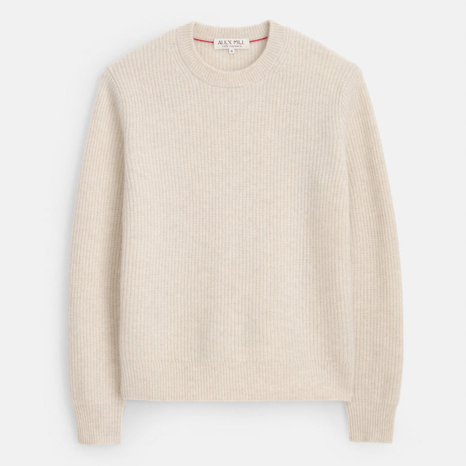 Beige ribbed sweater on a white background