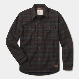 Plaid shirt with button details on a light gray background