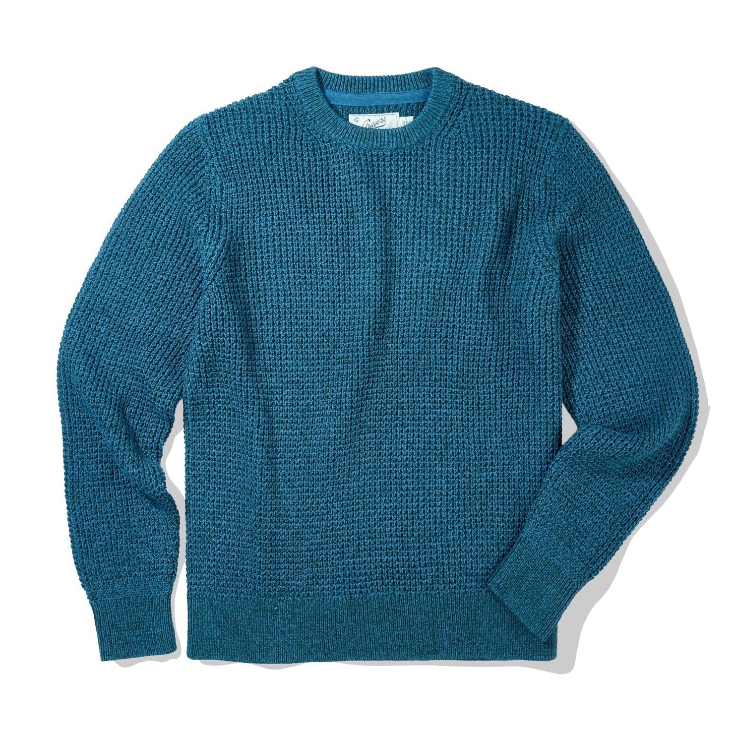 Blue textured sweater on a white background