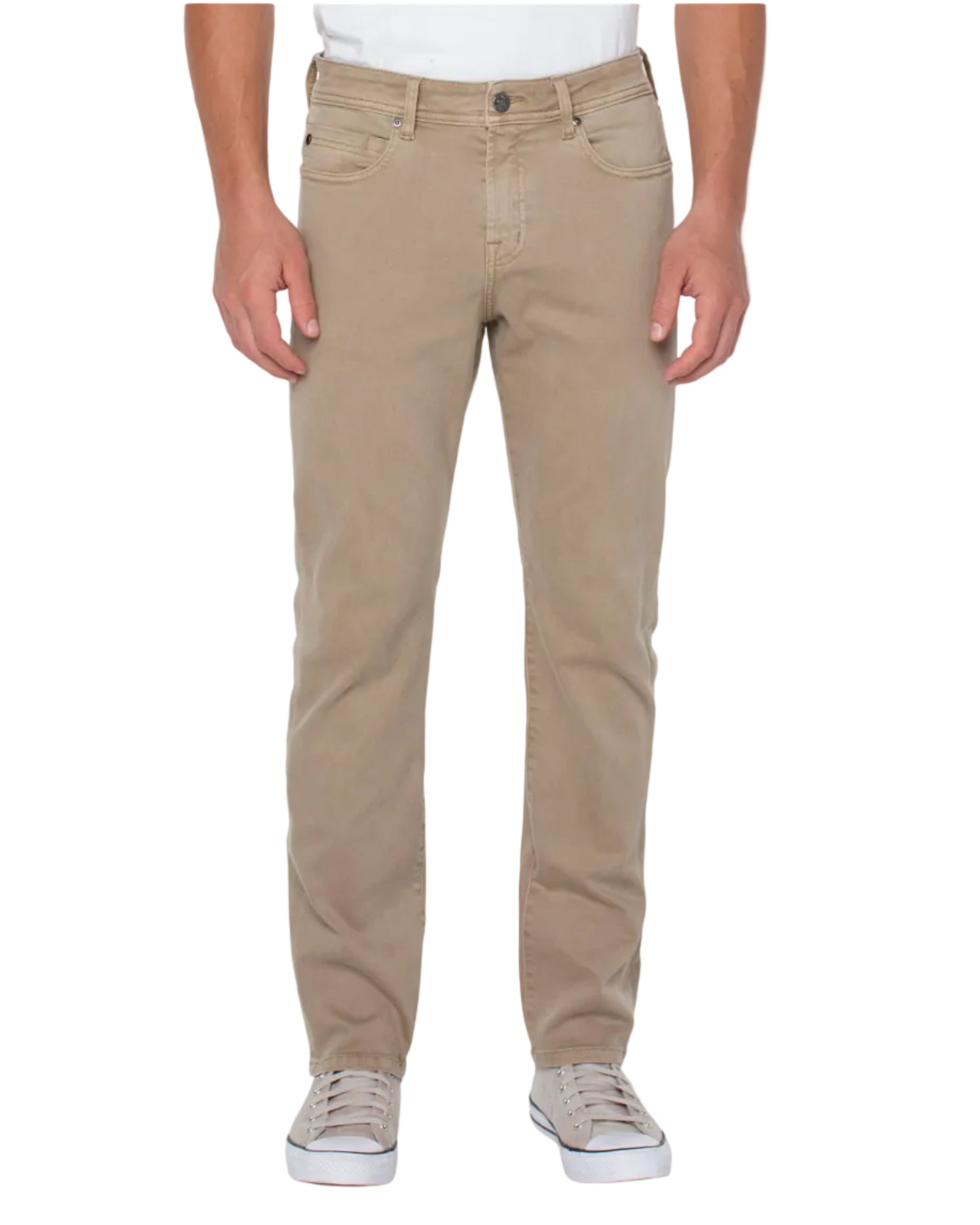 Beige pants worn by a person on a white background