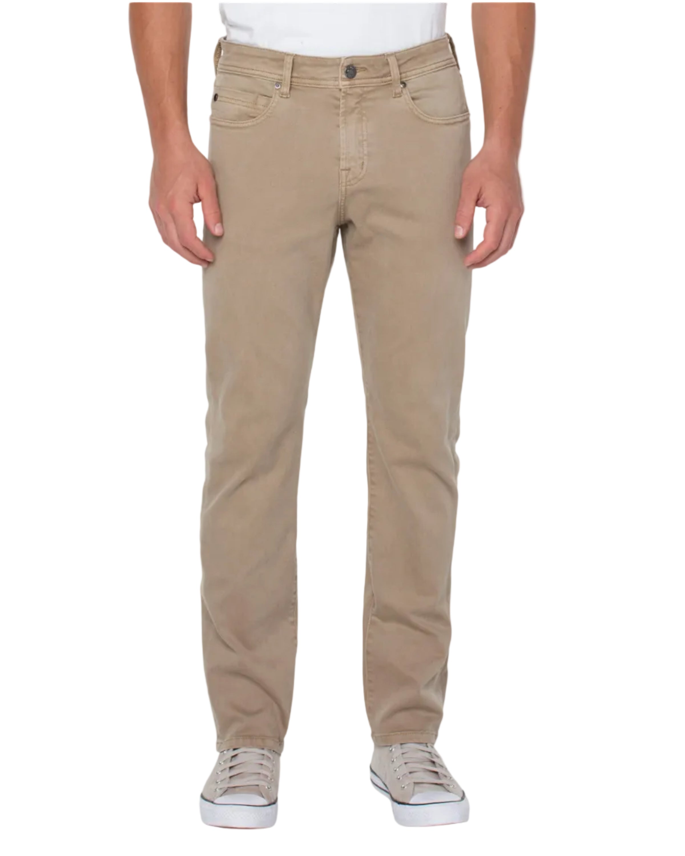 Beige pants worn by a person on a white background