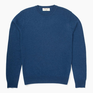 Blue sweater on a white background
