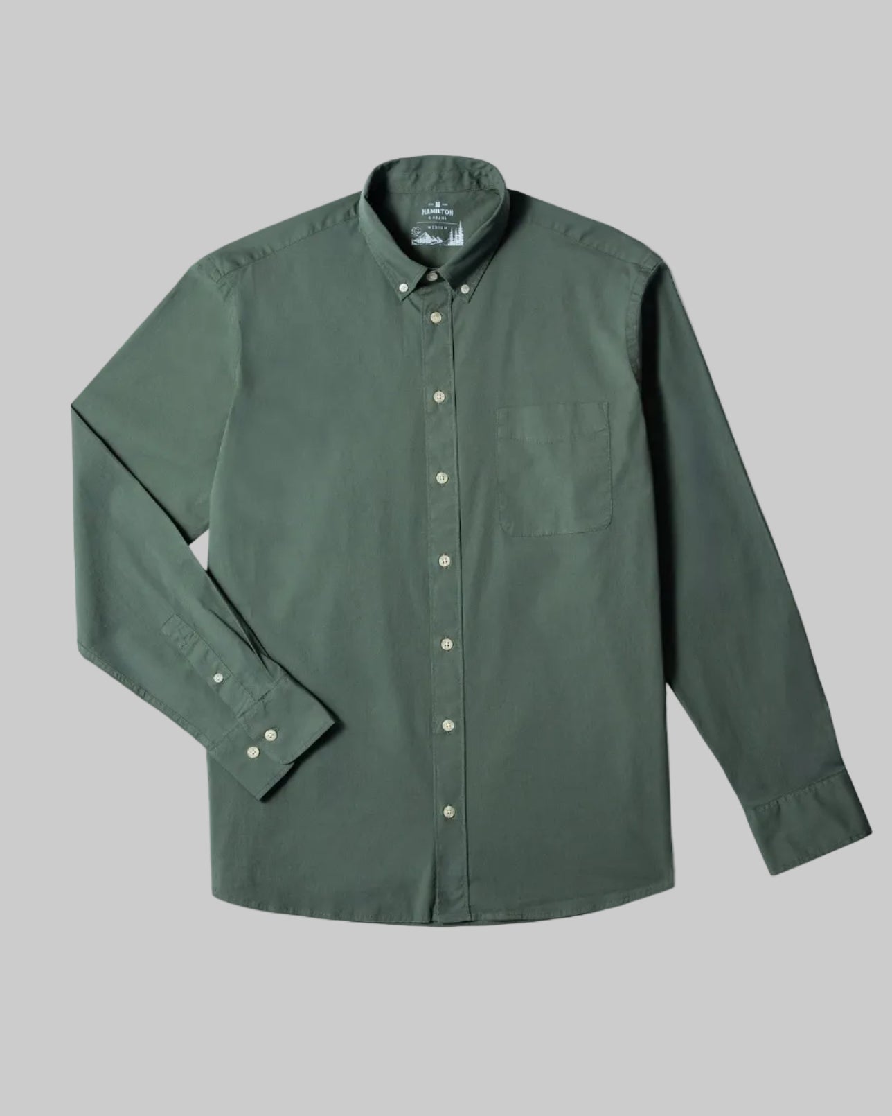 Green button-up shirt on a white background